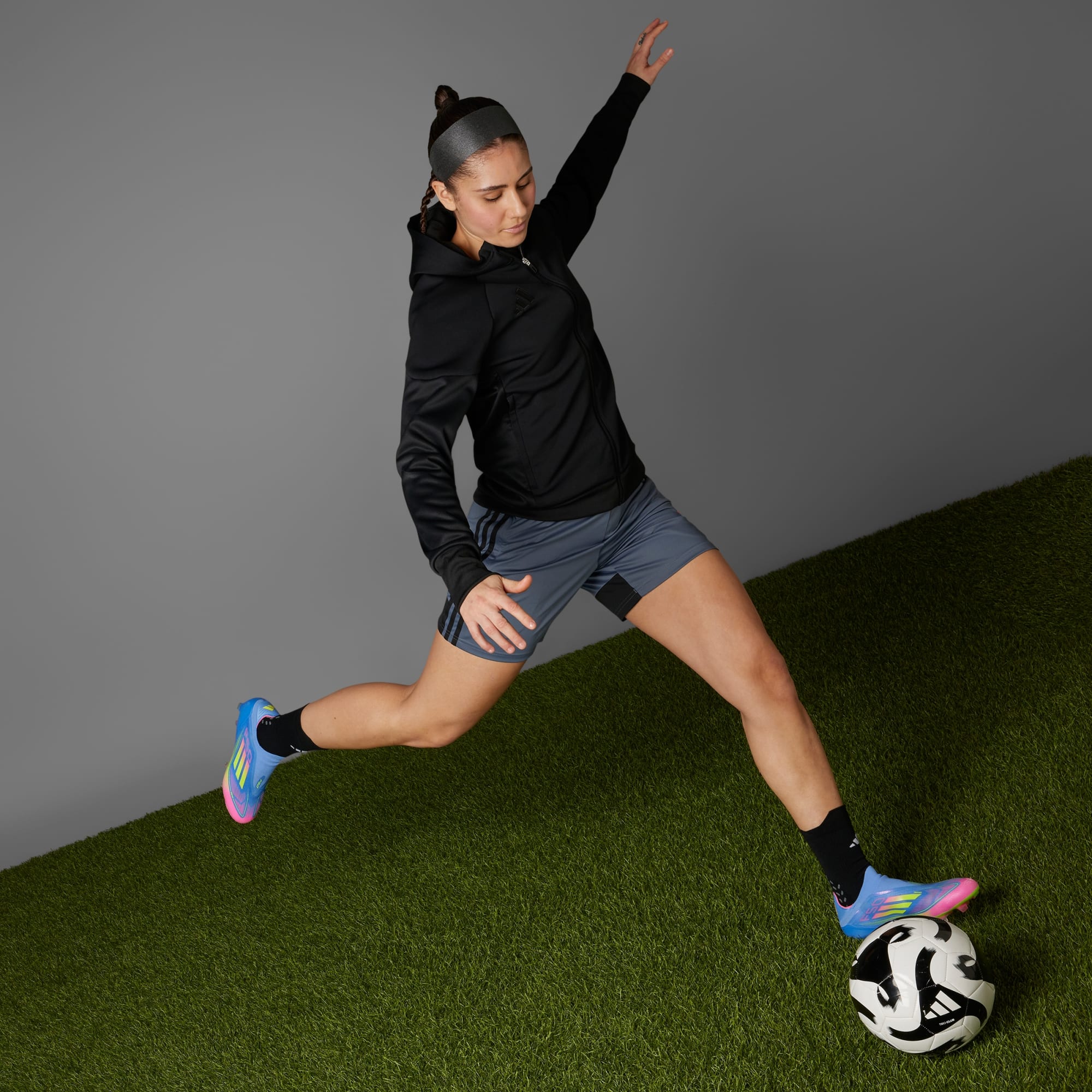 Botín de Fútbol F50 Elite Laceless FG Azul/Rosa