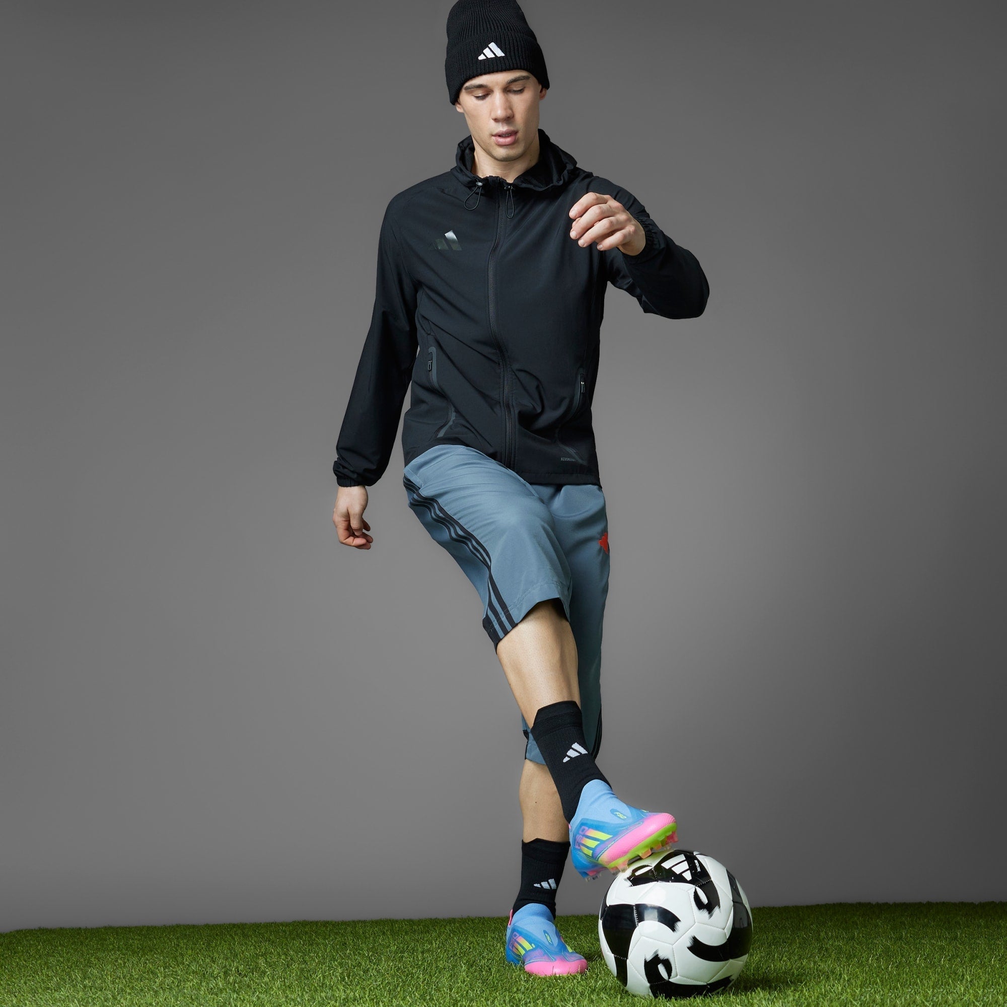 Botín de Fútbol F50 Elite Laceless FG Azul/Rosa